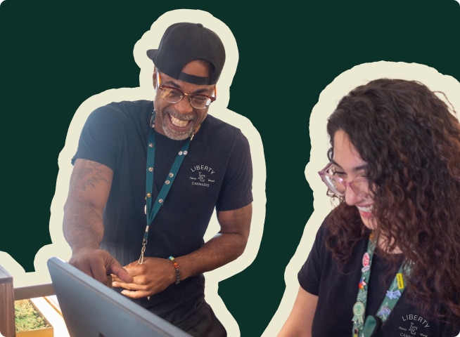 Happy staff members at Liberty Cannabis