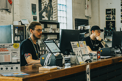 Liberty Maryland employees working behind counter