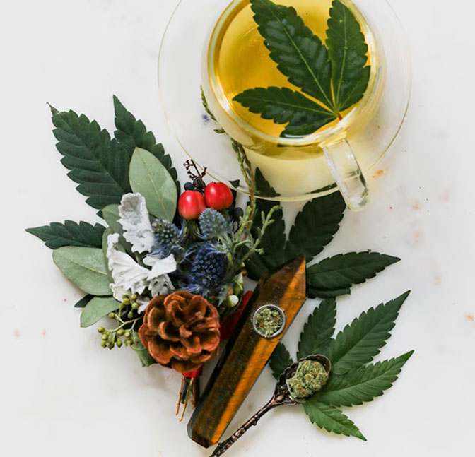 Cannabis buds with herbs and spices on a marble surface